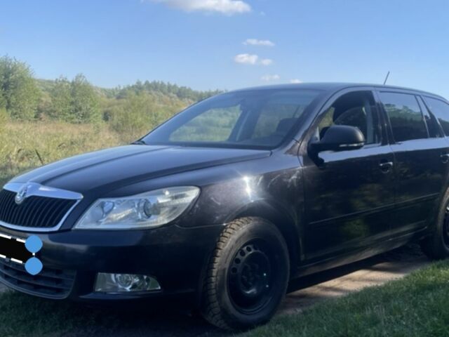 Черный Шкода Октавия, объемом двигателя 1.6 л и пробегом 230 тыс. км за 7300 $, фото 1 на Automoto.ua