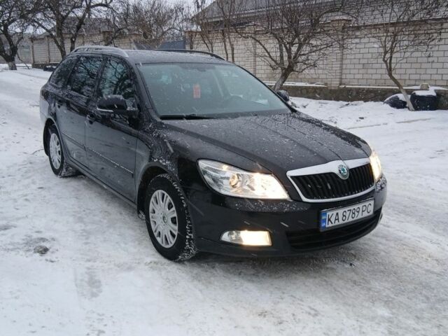 Чорний Шкода Октавія, об'ємом двигуна 1.6 л та пробігом 261 тис. км за 7999 $, фото 1 на Automoto.ua