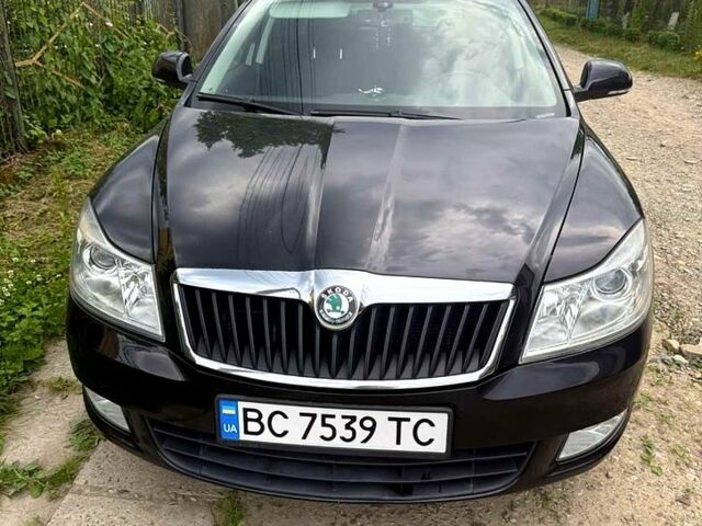 Чорний Шкода Октавія, об'ємом двигуна 1.2 л та пробігом 219 тис. км за 7800 $, фото 1 на Automoto.ua