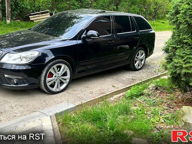 Черный Шкода Октавия, объемом двигателя 2 л и пробегом 27800 тыс. км за 11400 $, фото 1 на Automoto.ua