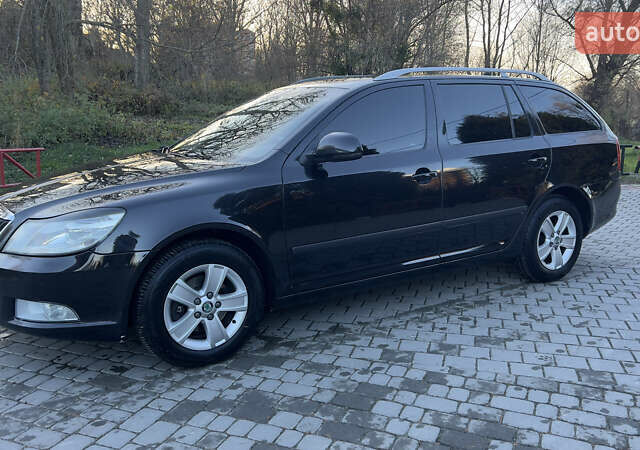 Черный Шкода Октавия, объемом двигателя 1.6 л и пробегом 290 тыс. км за 7900 $, фото 1 на Automoto.ua