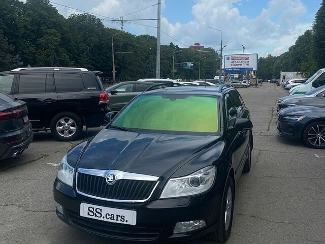 Черный Шкода Октавия, объемом двигателя 1.6 л и пробегом 228 тыс. км за 9500 $, фото 1 на Automoto.ua