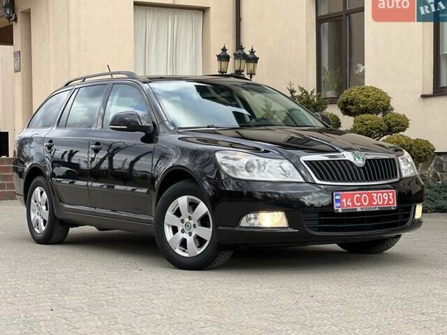 Чорний Шкода Октавія, об'ємом двигуна 1.6 л та пробігом 221 тис. км за 8999 $, фото 1 на Automoto.ua