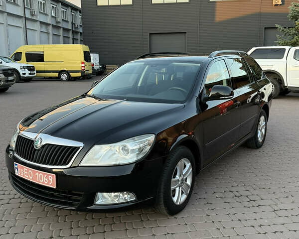 Черный Шкода Октавия, объемом двигателя 1.6 л и пробегом 255 тыс. км за 9100 $, фото 1 на Automoto.ua