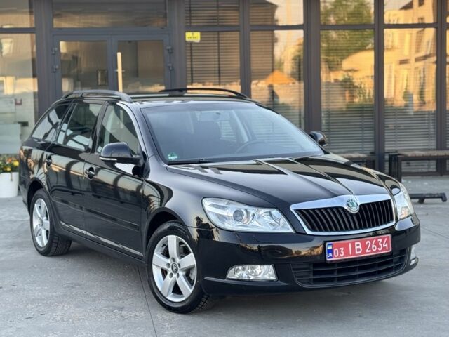 Черный Шкода Октавия, объемом двигателя 1.4 л и пробегом 184 тыс. км за 6999 $, фото 1 на Automoto.ua