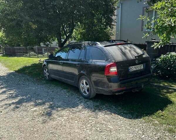 Черный Шкода Октавия, объемом двигателя 1.4 л и пробегом 185 тыс. км за 6500 $, фото 1 на Automoto.ua