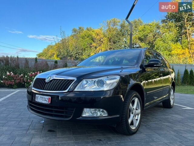 Черный Шкода Октавия, объемом двигателя 2 л и пробегом 223 тыс. км за 11950 $, фото 1 на Automoto.ua