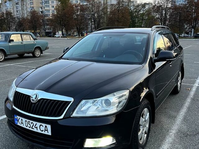 Черный Шкода Октавия, объемом двигателя 1.8 л и пробегом 333 тыс. км за 7500 $, фото 1 на Automoto.ua