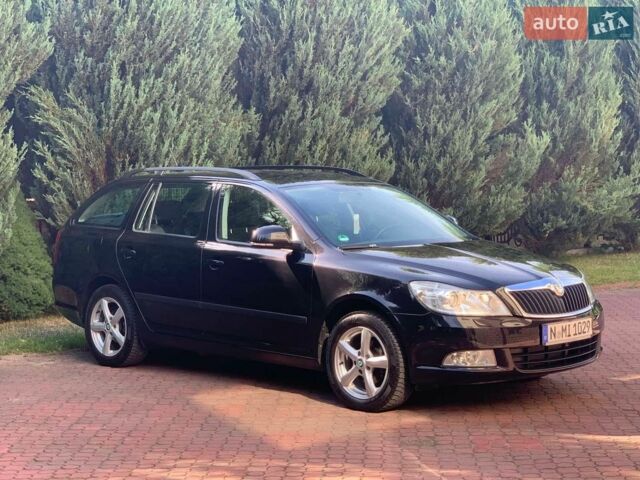 Чорний Шкода Октавія, об'ємом двигуна 1.6 л та пробігом 245 тис. км за 8595 $, фото 1 на Automoto.ua