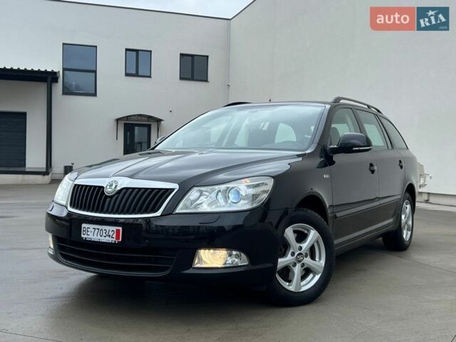 Чорний Шкода Октавія, об'ємом двигуна 2 л та пробігом 216 тис. км за 12350 $, фото 1 на Automoto.ua