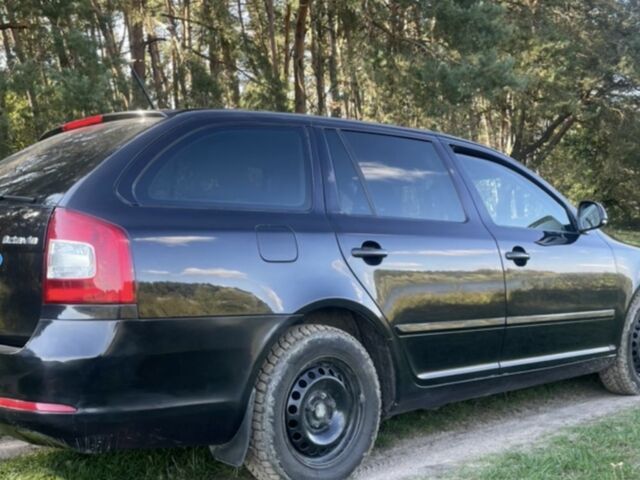 Черный Шкода Октавия, объемом двигателя 1.6 л и пробегом 230 тыс. км за 7332 $, фото 1 на Automoto.ua