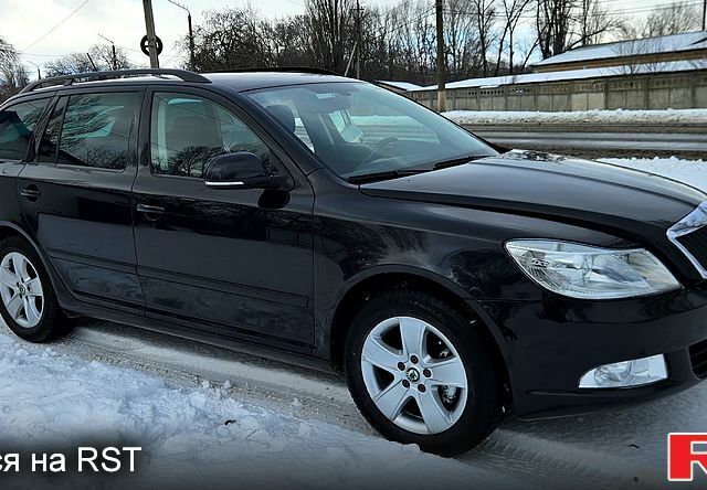Чорний Шкода Октавія, об'ємом двигуна 2 л та пробігом 153 тис. км за 7800 $, фото 1 на Automoto.ua