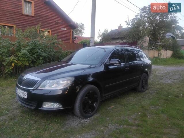Черный Шкода Октавия, объемом двигателя 1.6 л и пробегом 220 тыс. км за 9250 $, фото 1 на Automoto.ua