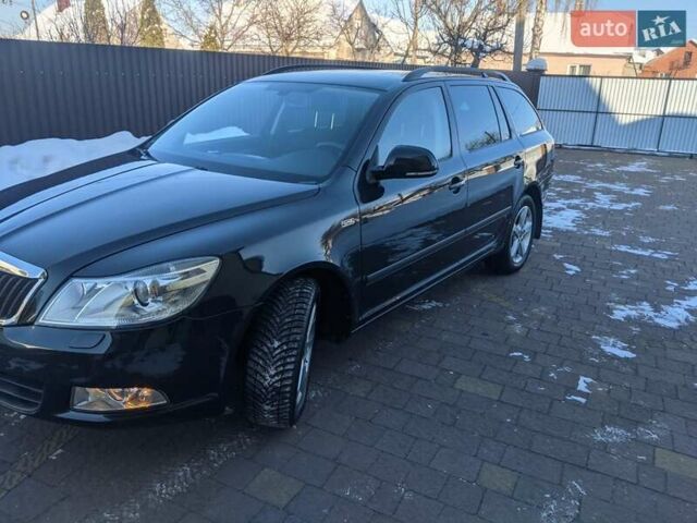 Черный Шкода Октавия, объемом двигателя 1.4 л и пробегом 175 тыс. км за 7777 $, фото 1 на Automoto.ua