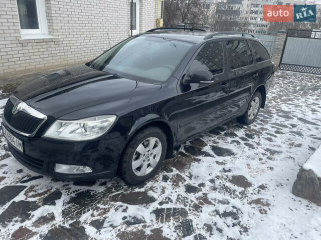 Черный Шкода Октавия, объемом двигателя 1.6 л и пробегом 325 тыс. км за 8500 $, фото 1 на Automoto.ua