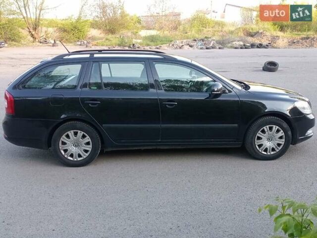 Чорний Шкода Октавія, об'ємом двигуна 1.8 л та пробігом 196 тис. км за 7200 $, фото 1 на Automoto.ua