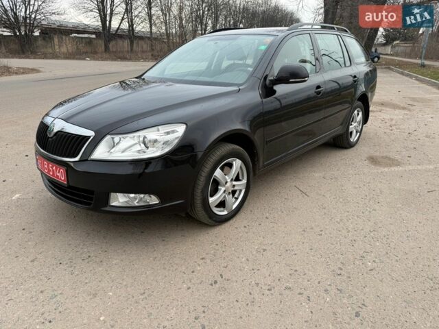 Черный Шкода Октавия, объемом двигателя 2 л и пробегом 191 тыс. км за 10300 $, фото 1 на Automoto.ua