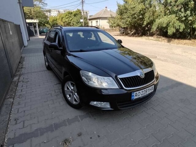 Черный Шкода Октавия, объемом двигателя 2 л и пробегом 303 тыс. км за 9600 $, фото 1 на Automoto.ua