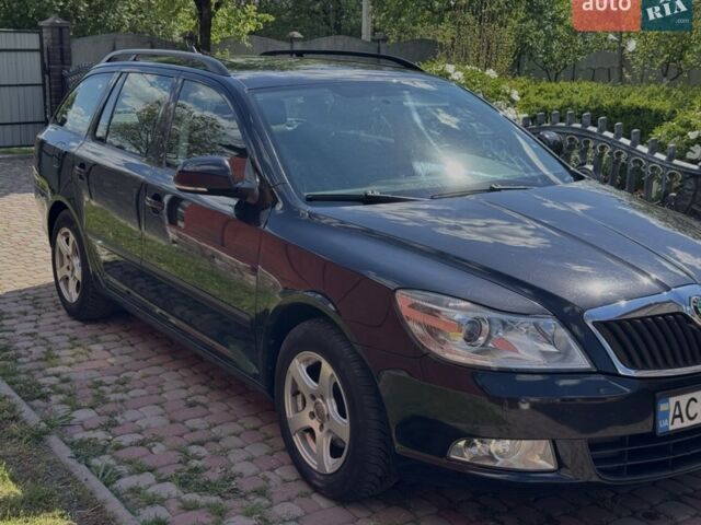 Черный Шкода Октавия, объемом двигателя 1.6 л и пробегом 255 тыс. км за 8950 $, фото 1 на Automoto.ua