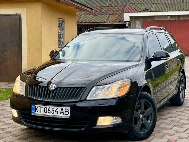 Черный Шкода Октавия, объемом двигателя 2 л и пробегом 205 тыс. км за 7700 $, фото 1 на Automoto.ua