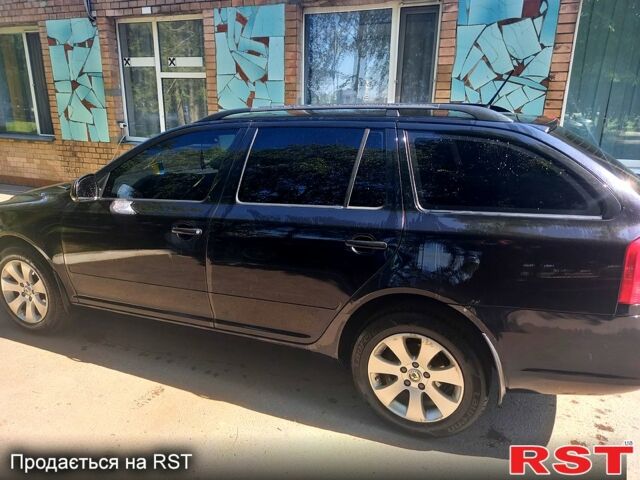 Черный Шкода Октавия, объемом двигателя 1.6 л и пробегом 303 тыс. км за 7800 $, фото 1 на Automoto.ua