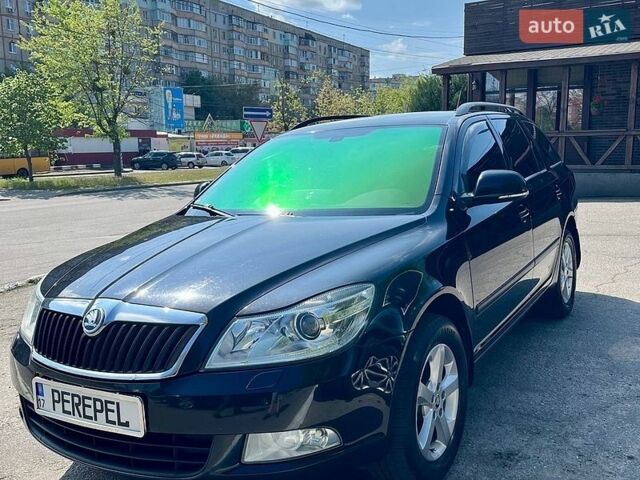 Черный Шкода Октавия, объемом двигателя 1.6 л и пробегом 223 тыс. км за 10000 $, фото 1 на Automoto.ua