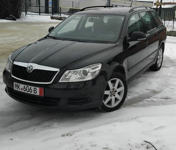 Черный Шкода Октавия, объемом двигателя 1.4 л и пробегом 202 тыс. км за 7100 $, фото 1 на Automoto.ua