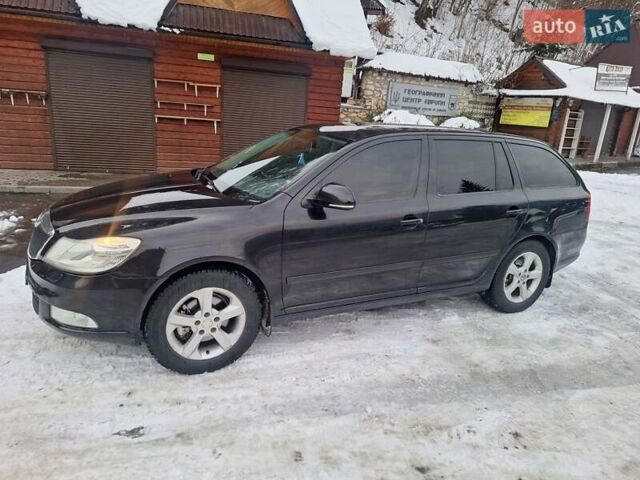 Черный Шкода Октавия, объемом двигателя 2 л и пробегом 322 тыс. км за 9000 $, фото 1 на Automoto.ua