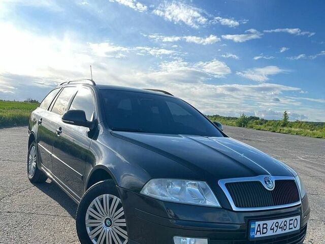 Черный Шкода Октавия, объемом двигателя 1.6 л и пробегом 220 тыс. км за 7499 $, фото 1 на Automoto.ua