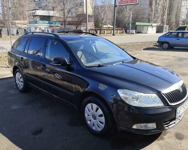 Черный Шкода Октавия, объемом двигателя 1.6 л и пробегом 264 тыс. км за 9454 $, фото 1 на Automoto.ua