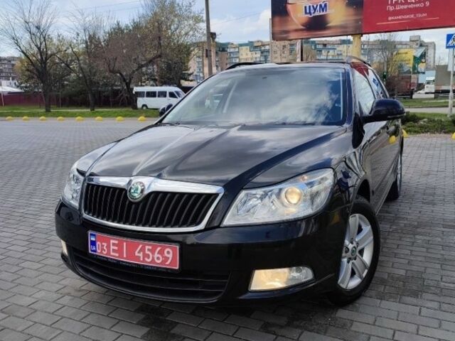 Черный Шкода Октавия, объемом двигателя 1 л и пробегом 206 тыс. км за 8799 $, фото 1 на Automoto.ua