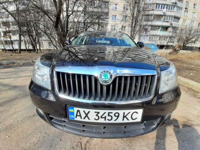 Чорний Шкода Октавія, об'ємом двигуна 1.6 л та пробігом 244 тис. км за 9400 $, фото 1 на Automoto.ua