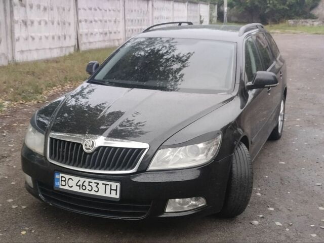 Черный Шкода Октавия, объемом двигателя 2 л и пробегом 332 тыс. км за 7700 $, фото 1 на Automoto.ua