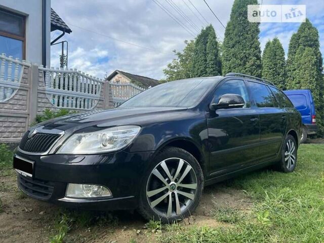 Чорний Шкода Октавія, об'ємом двигуна 2 л та пробігом 190 тис. км за 9500 $, фото 1 на Automoto.ua