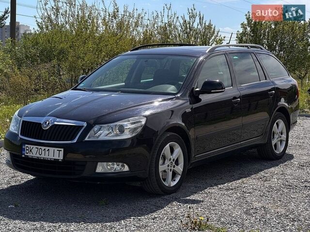Черный Шкода Октавия, объемом двигателя 1.8 л и пробегом 255 тыс. км за 8500 $, фото 1 на Automoto.ua
