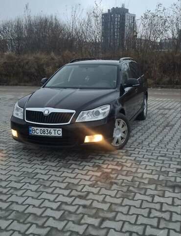 Черный Шкода Октавия, объемом двигателя 2 л и пробегом 294 тыс. км за 7800 $, фото 1 на Automoto.ua