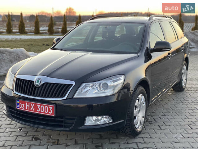 Черный Шкода Октавия, объемом двигателя 1.6 л и пробегом 160 тыс. км за 8550 $, фото 1 на Automoto.ua