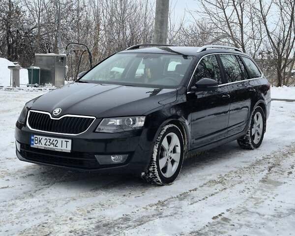 Черный Шкода Октавия, объемом двигателя 1.6 л и пробегом 253 тыс. км за 12550 $, фото 1 на Automoto.ua