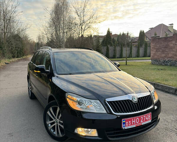 Черный Шкода Октавия, объемом двигателя 2 л и пробегом 217 тыс. км за 10550 $, фото 1 на Automoto.ua