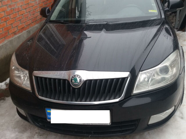 Чорний Шкода Октавія, об'ємом двигуна 2 л та пробігом 142 тис. км за 11900 $, фото 1 на Automoto.ua