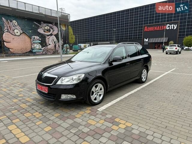 Черный Шкода Октавия, объемом двигателя 1.6 л и пробегом 220 тыс. км за 11600 $, фото 1 на Automoto.ua