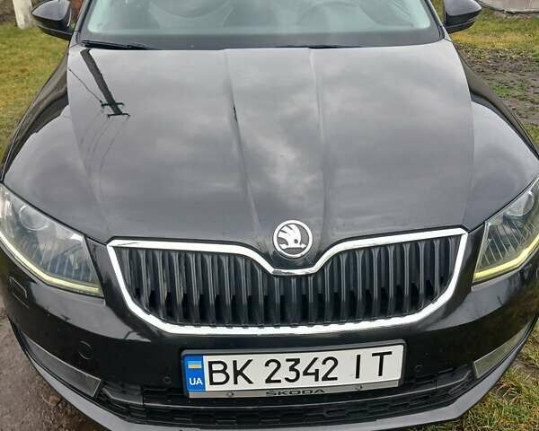 Черный Шкода Октавия, объемом двигателя 1.6 л и пробегом 253 тыс. км за 10700 $, фото 1 на Automoto.ua