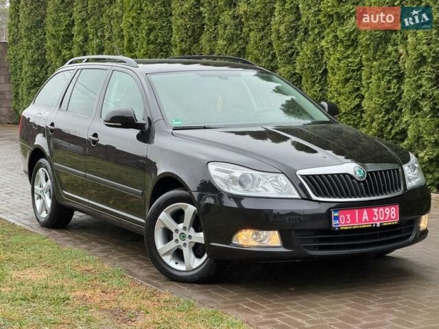 Черный Шкода Октавия, объемом двигателя 2 л и пробегом 230 тыс. км за 12500 $, фото 1 на Automoto.ua