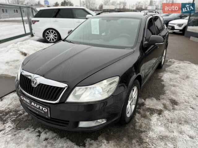 Черный Шкода Октавия, объемом двигателя 1.6 л и пробегом 330 тыс. км за 8790 $, фото 1 на Automoto.ua