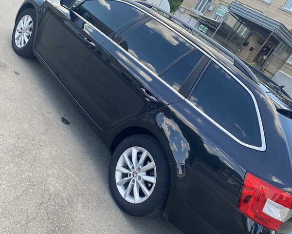 Черный Шкода Октавия, объемом двигателя 1.6 л и пробегом 310 тыс. км за 11700 $, фото 1 на Automoto.ua