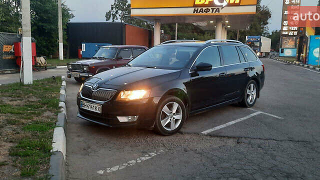 Черный Шкода Октавия, объемом двигателя 1.6 л и пробегом 230 тыс. км за 12800 $, фото 1 на Automoto.ua