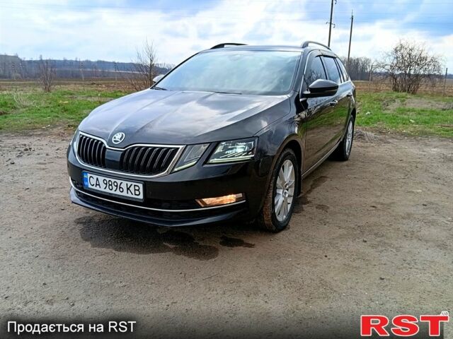 Черный Шкода Октавия, объемом двигателя 2 л и пробегом 293 тыс. км за 13300 $, фото 1 на Automoto.ua