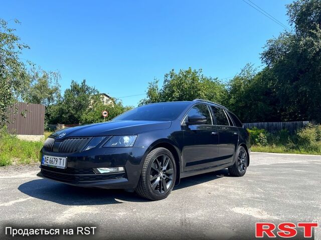 Чорний Шкода Октавія, об'ємом двигуна 2 л та пробігом 305 тис. км за 14100 $, фото 1 на Automoto.ua