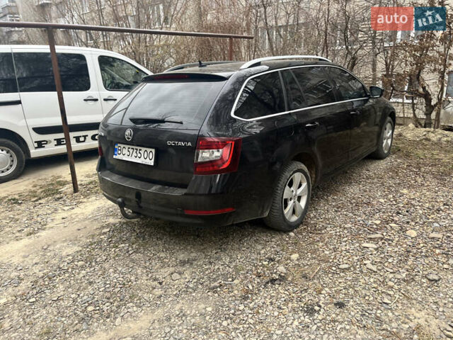 Черный Шкода Октавия, объемом двигателя 2 л и пробегом 225 тыс. км за 16900 $, фото 1 на Automoto.ua