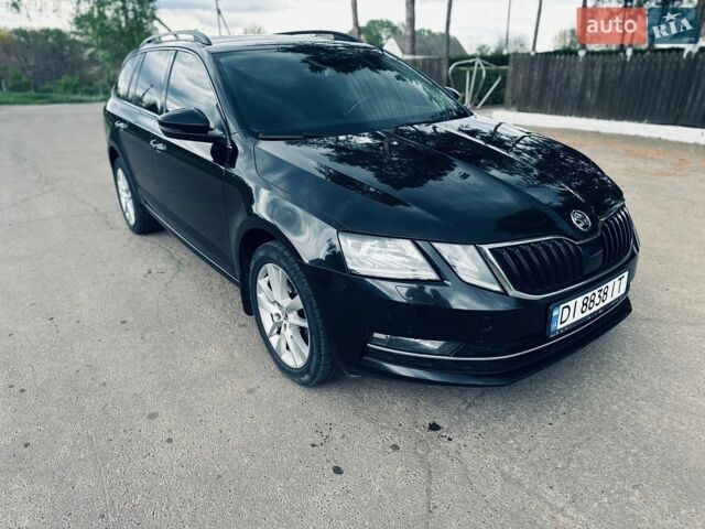 Черный Шкода Октавия, объемом двигателя 2 л и пробегом 295 тыс. км за 12999 $, фото 1 на Automoto.ua